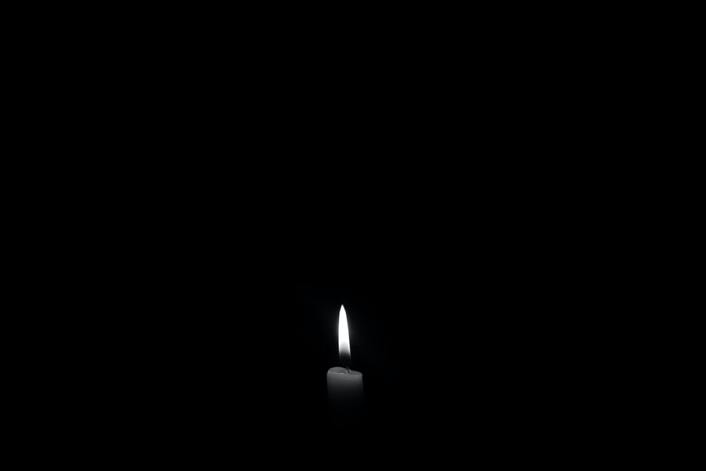 candle providing light during power outage