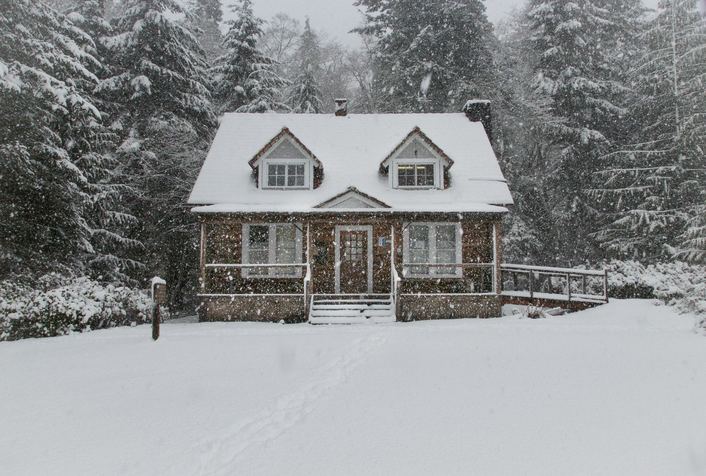 house during winter and snow storm