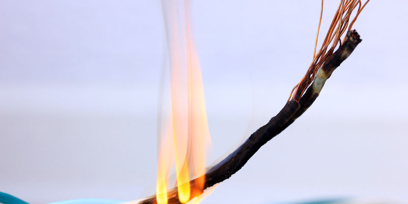 frayed cable on fire