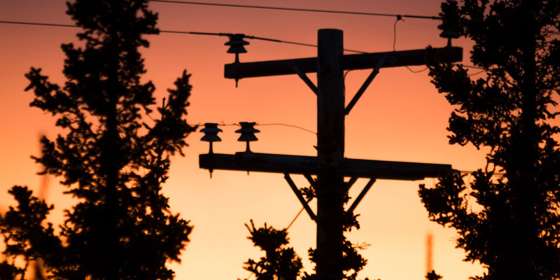 utility power pole at sunset