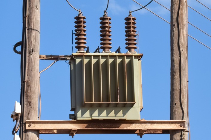 distribution transformer mounted to utility pole