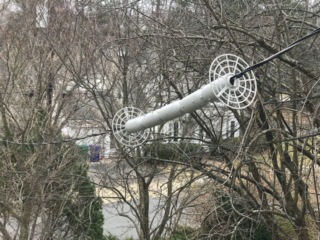 line guard on triplex power line leading to home
