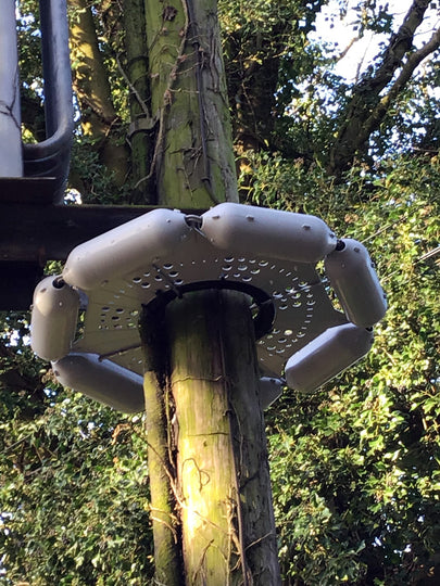 close up of pole guard on a utility pole